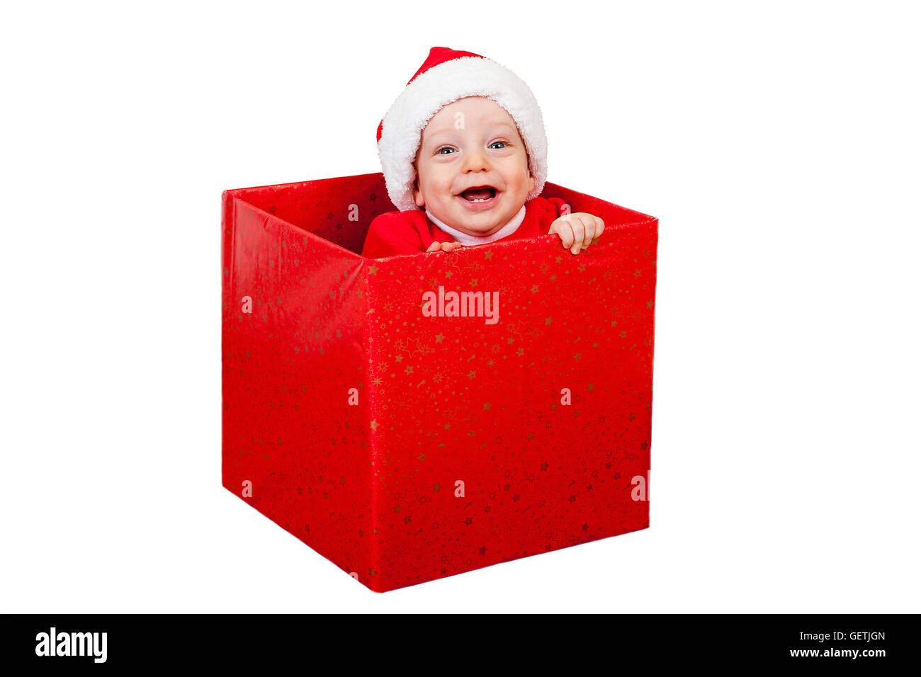 Christmas baby in red gift box Stock Photo Alamy