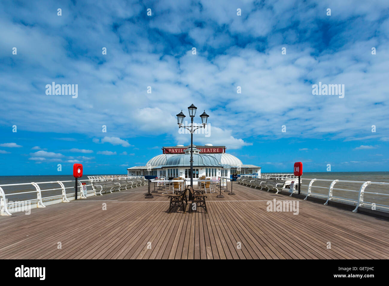View along Cromer pier to the Pavilion theatre. Stock Photo