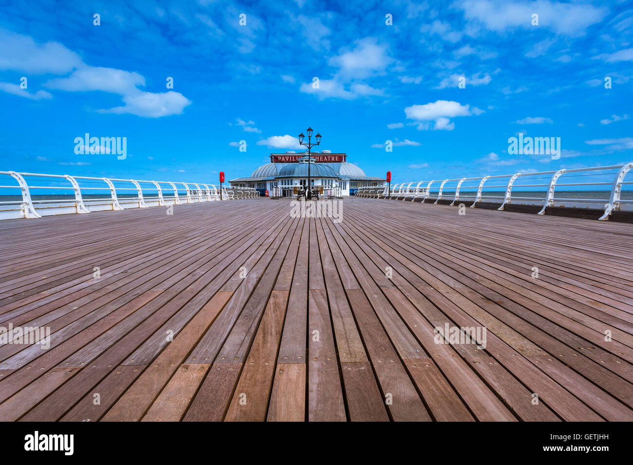 View along Cromer pier to the Pavilion theatre. Stock Photo