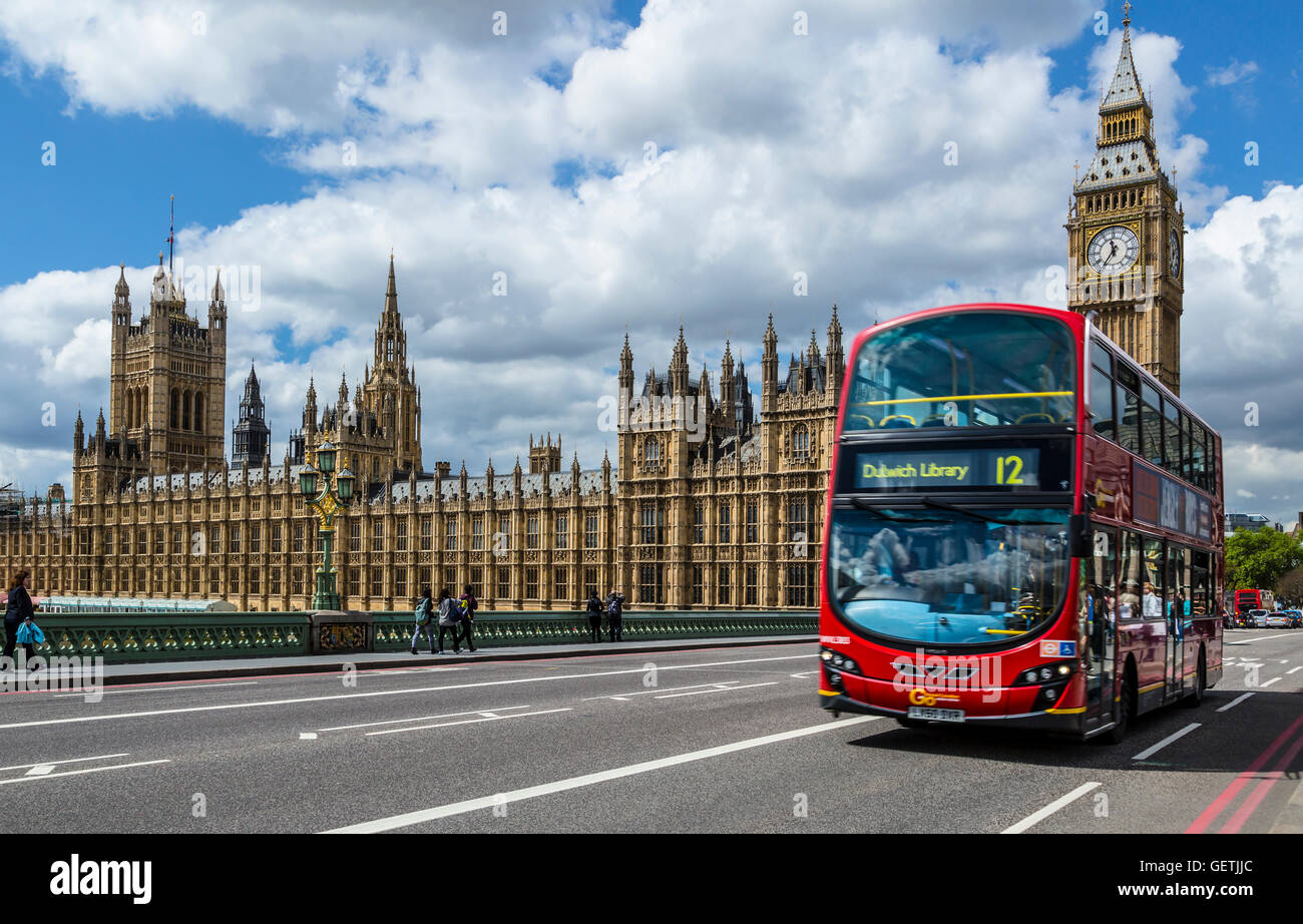 A London Bus in front of The Houses of Parliament. Stock Photo