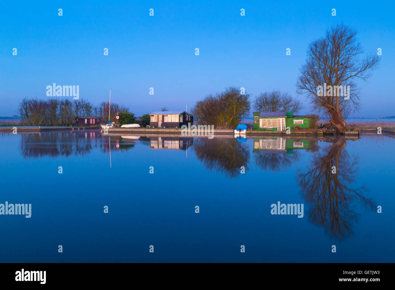 A tranquil dawn on the River Thurne on the Norfolk Broads. Stock Photo