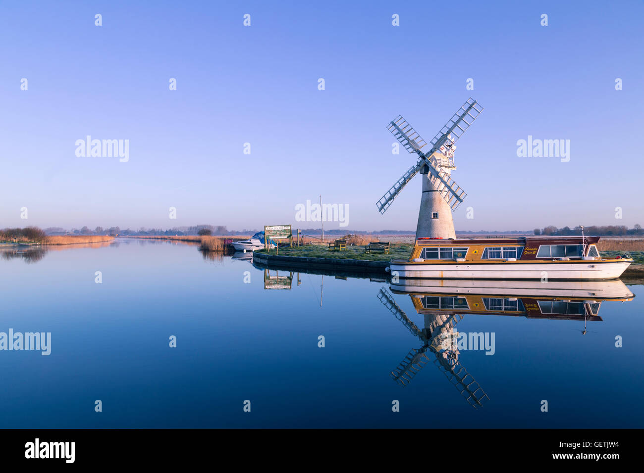 A tranquil dawn on the River Thurne on the Norfolk Broads. Stock Photo