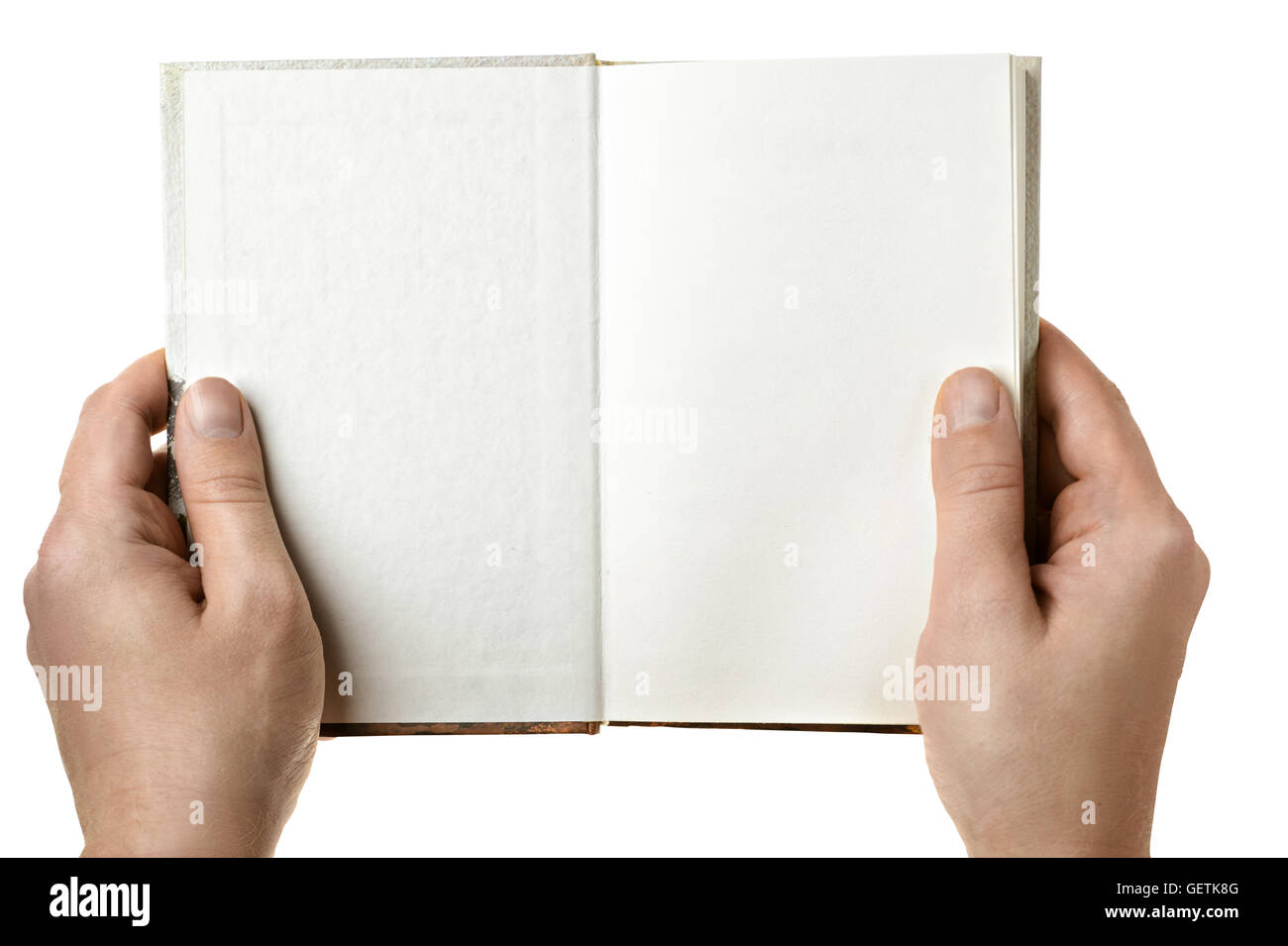 An open book in hand with isolated background Stock Photo
