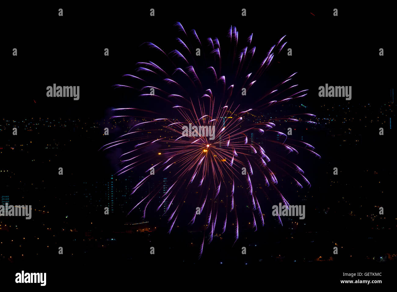 single red purple fireworks burst Stock Photo
