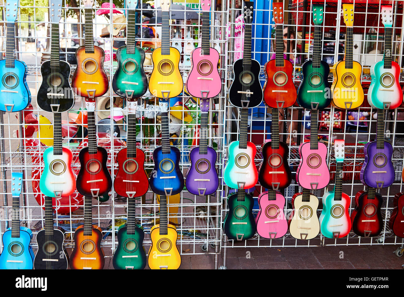 Display of mini guitars. Stock Photo