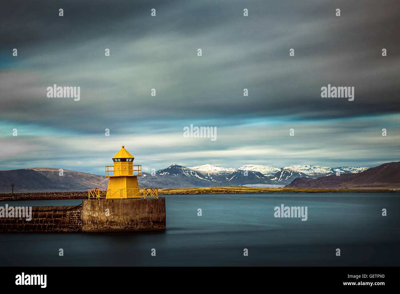 The yellow lighthouse Nordurgardi at Reykjavik harbour. Stock Photo