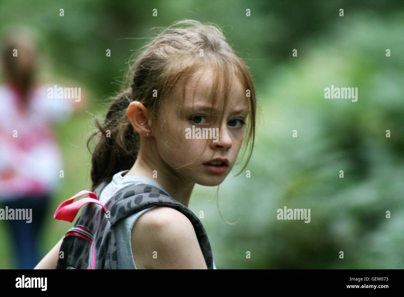 young girl looking at camera Stock Photo
