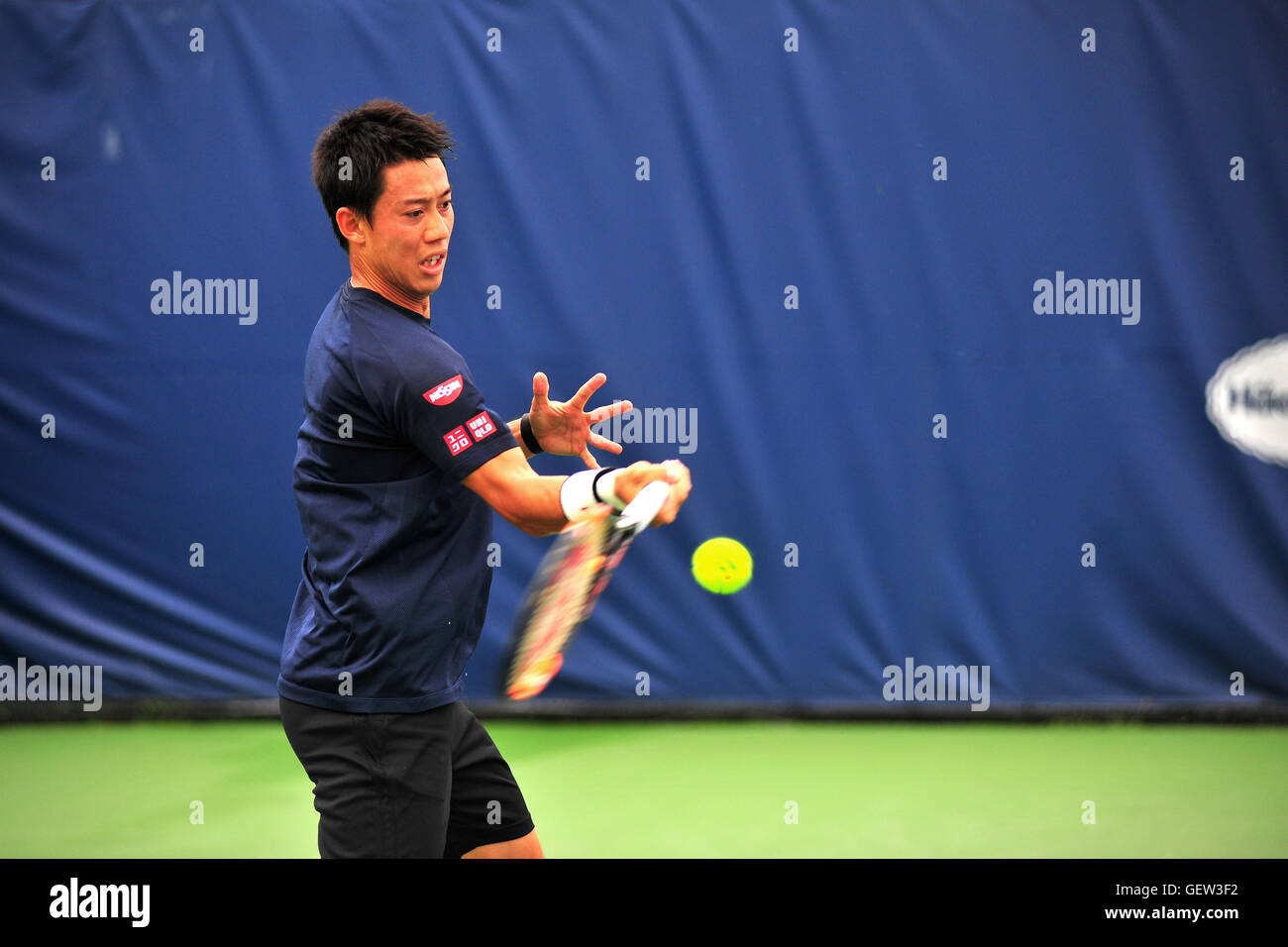 The Japanese tennis player Kei Nishikori practicing at the 2016 Rogers