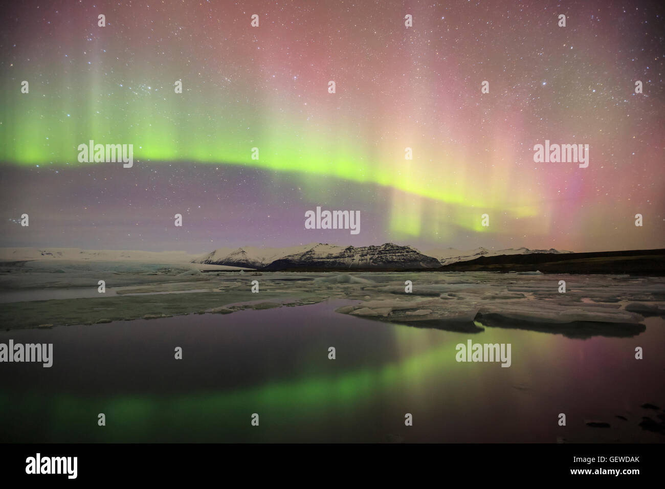 Northern lights over Jokulsarlon Glacier Lagoon in Iceland. Stock Photo
