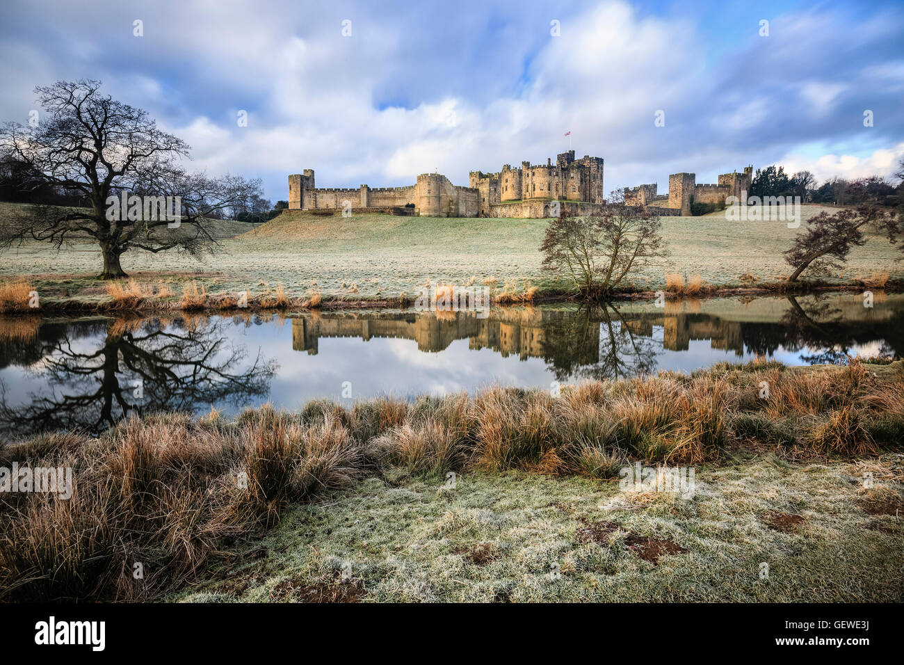 Alnwick Castle in Northumberland from across the River Aln Stock Photo ...