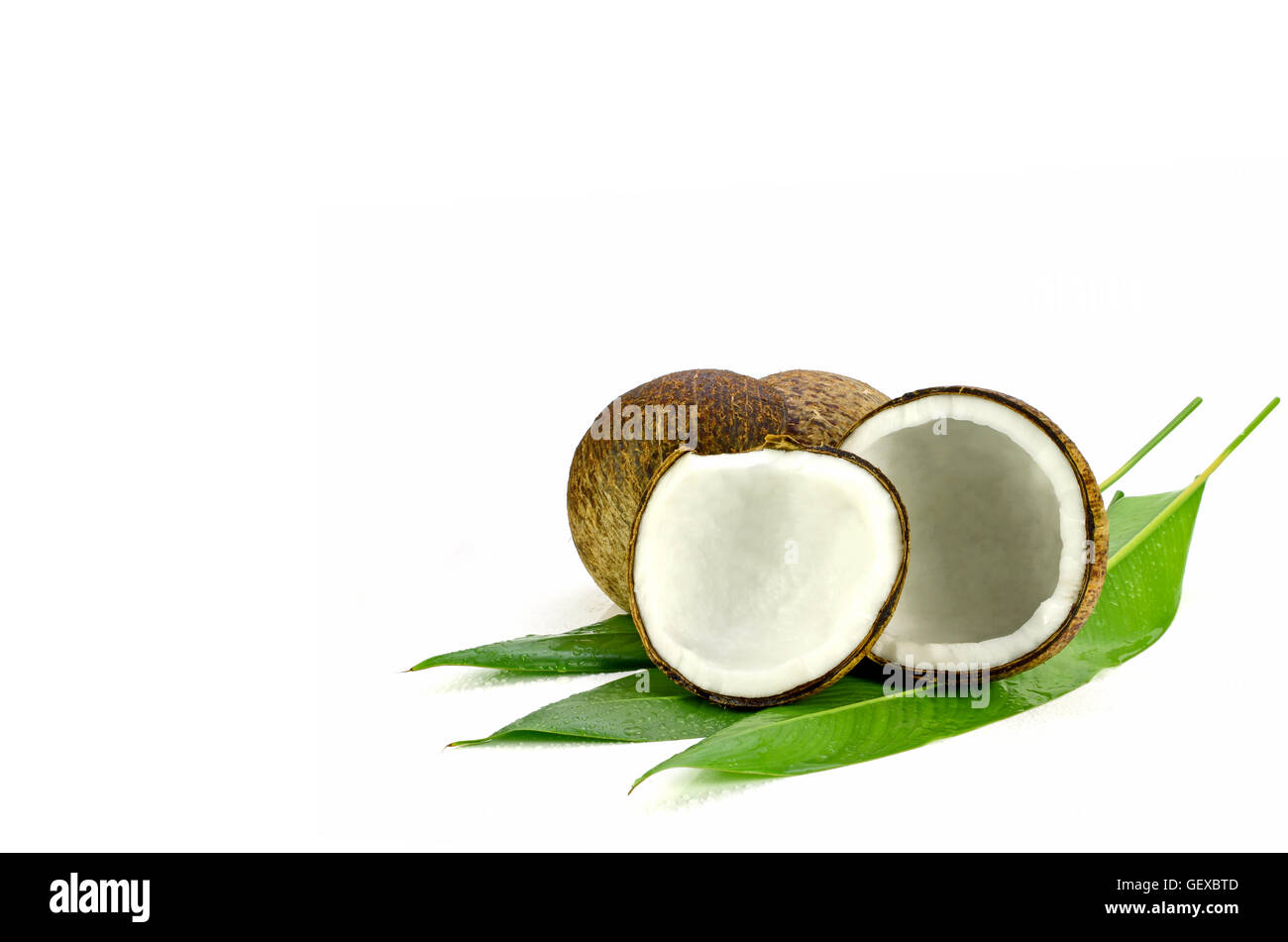 Coconut (Cocos nucifera). Cut coconut shell with fresh organic coconut kernel redy for make