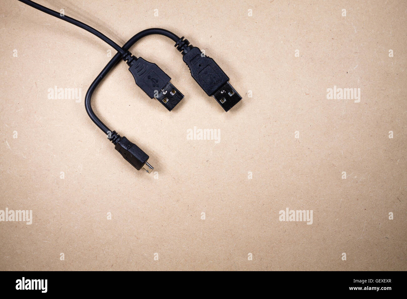 Usb plug isolated over wodden background Stock Photo - Alamy