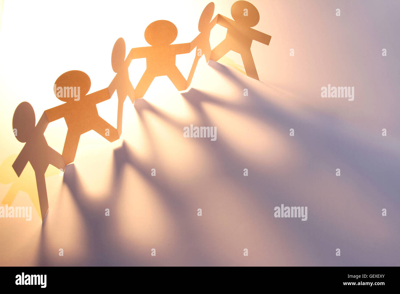 Team 2 Paper Team of paper doll people Stock Photo - Alamy