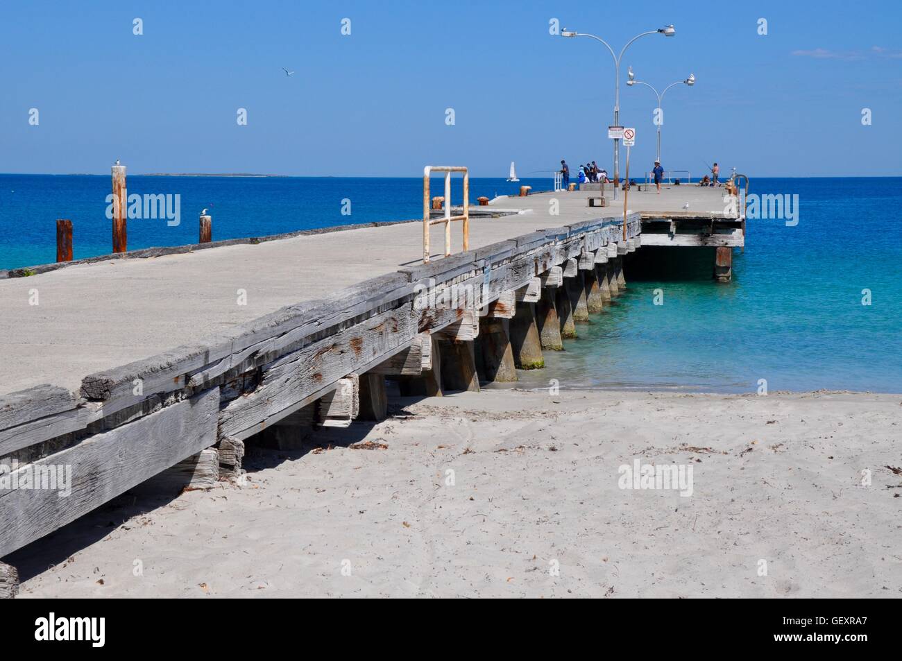 Coogee,WA,Australia-November 13,2015:Coogee Beach jetty with fisherman and the Indian Ocean seascape in Coogee,Western Australia. Stock Photo