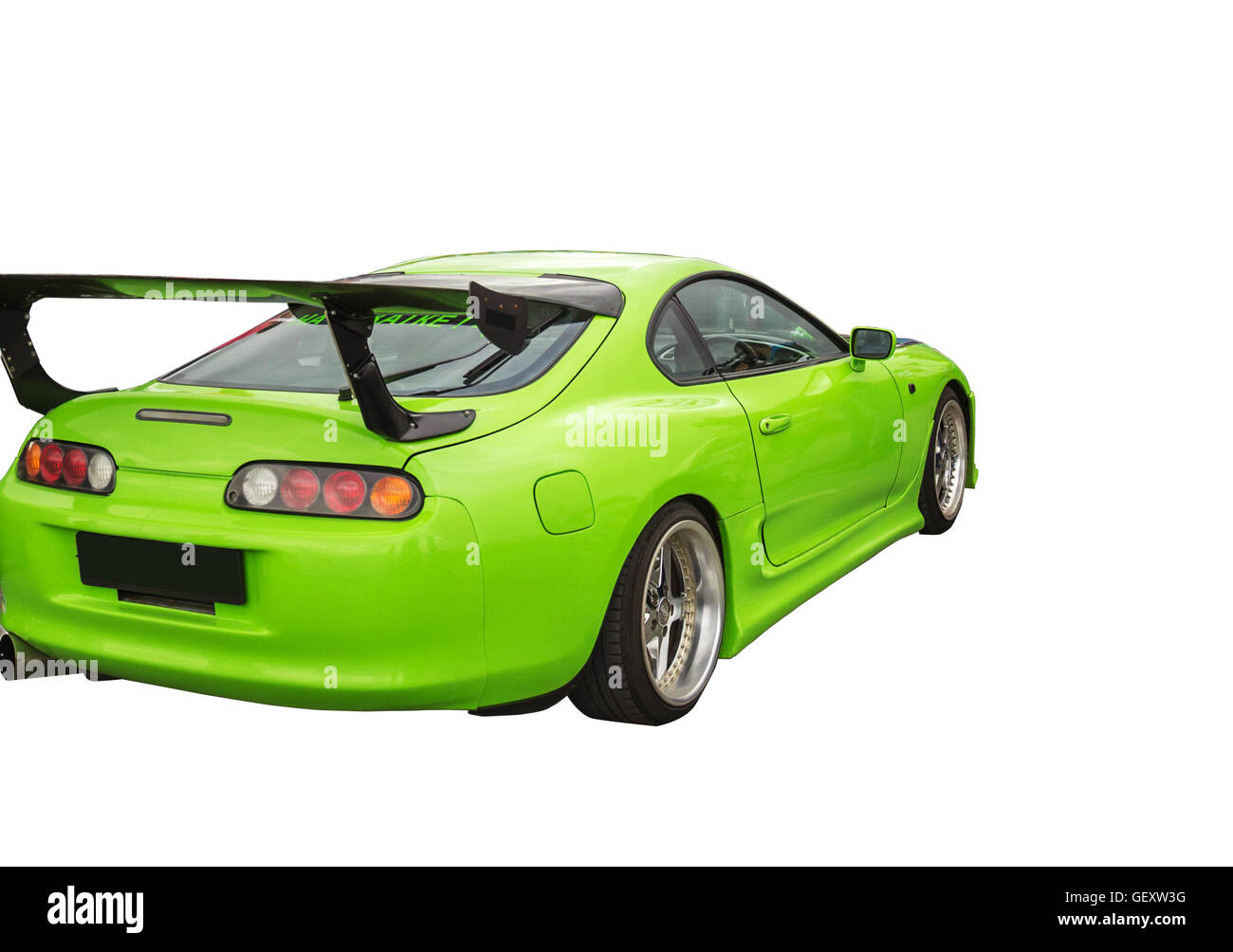 Sports car green color on a white background Stock Photo - Alamy