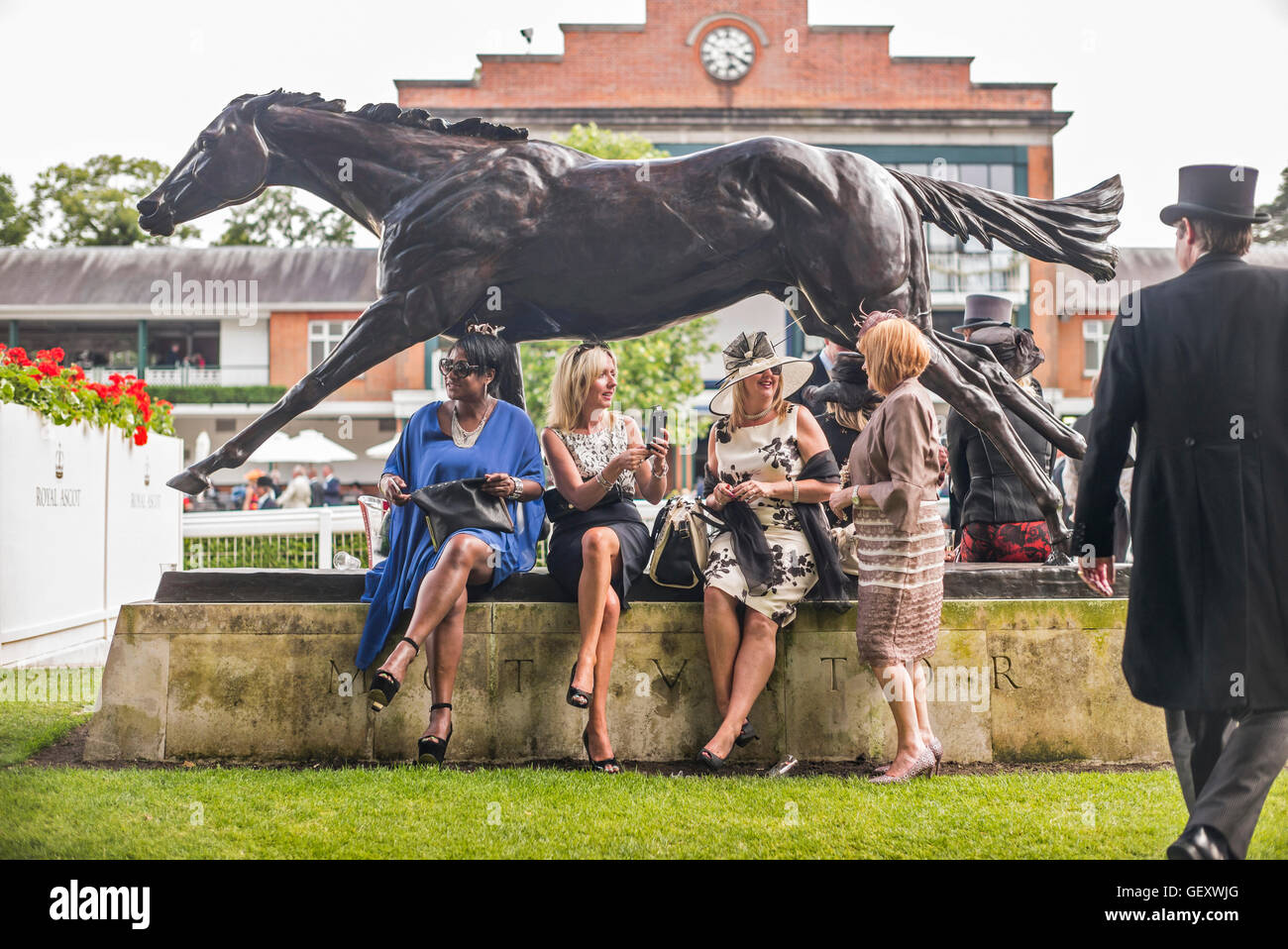 People enjoying the atmosphere on Ladies Day at Ascot Racecourse. Stock Photo