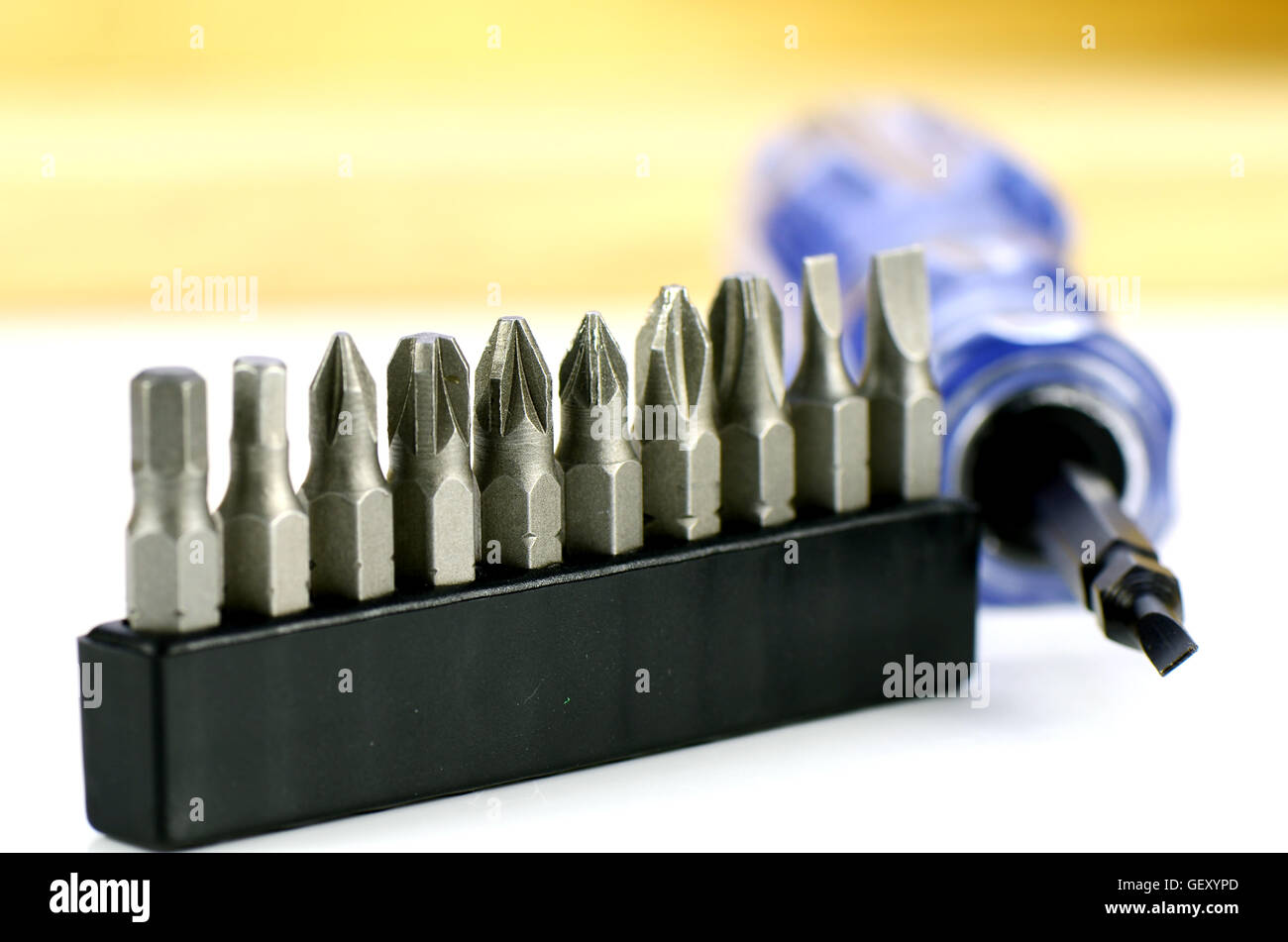 Cordless screwdrivers with various kind of screw tips. Stock Photo