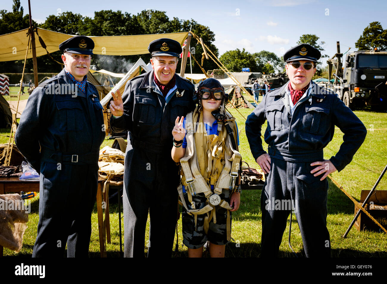 Men in RAF uniforms posing for photos to collect for charity at The 6th Annual Combined Ops Show. Stock Photo