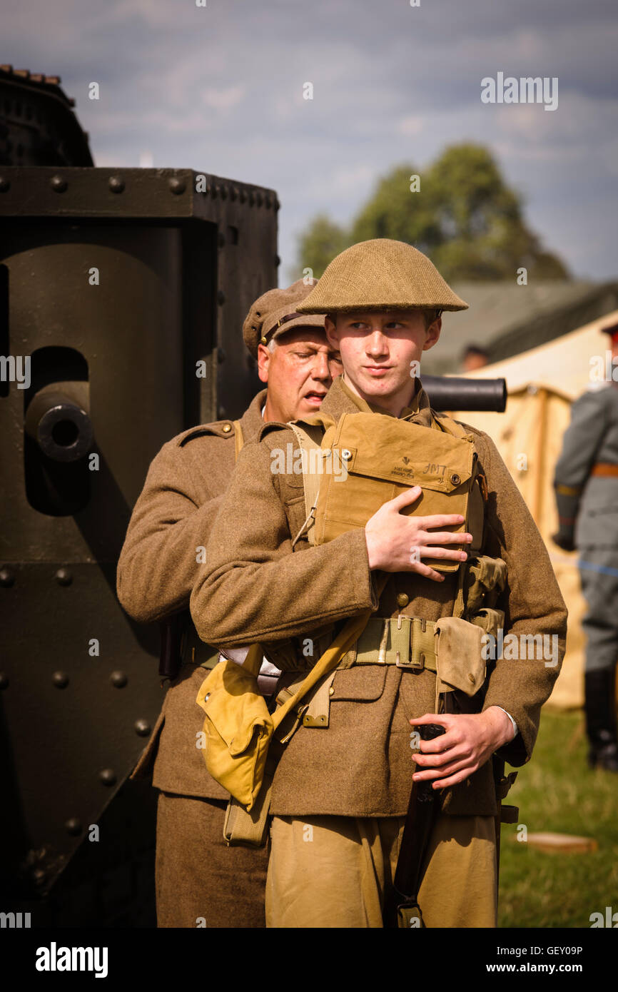 Posing in front of a N17 Niveleur WW1 Mk lV Tank replica at The 6th Annual Combined Ops Show. Stock Photo