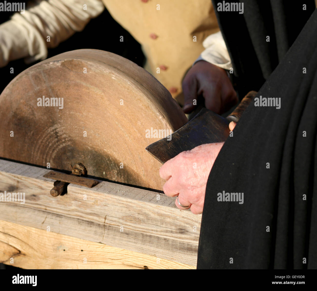 https://c8.alamy.com/comp/GEY0DR/elder-knife-sharpener-sharpens-the-knife-on-the-grinding-wheel-GEY0DR.jpg