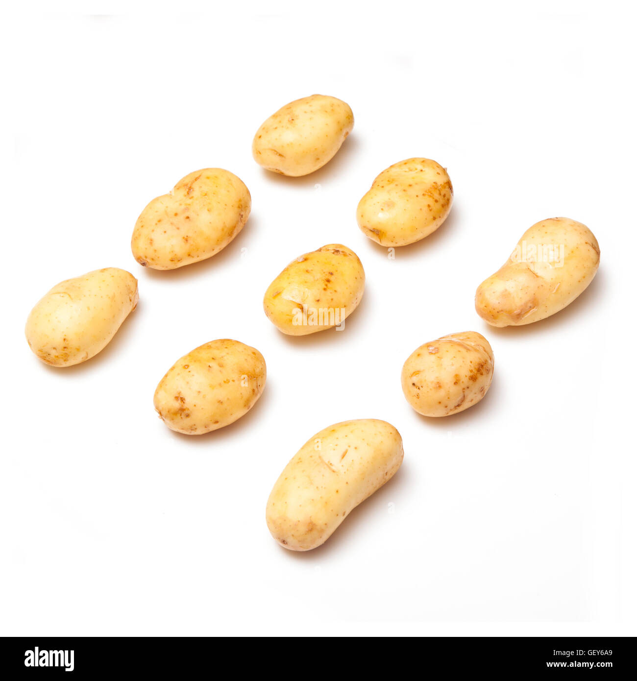White potatoes isolated on a white studio background Stock Photo - Alamy