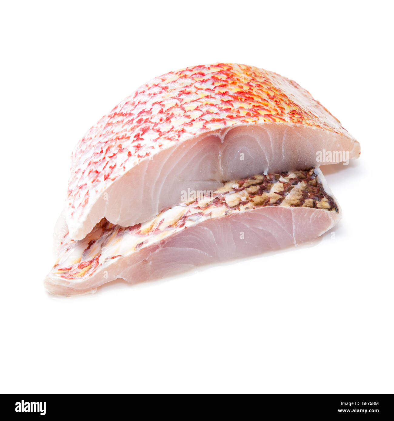 Raw Red Snapper fish fillets isolated on a white studio background. Stock Photo