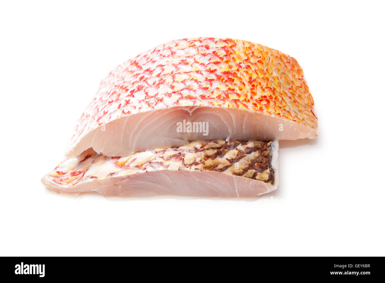 Raw Red Snapper fish fillets isolated on a white studio background. Stock Photo