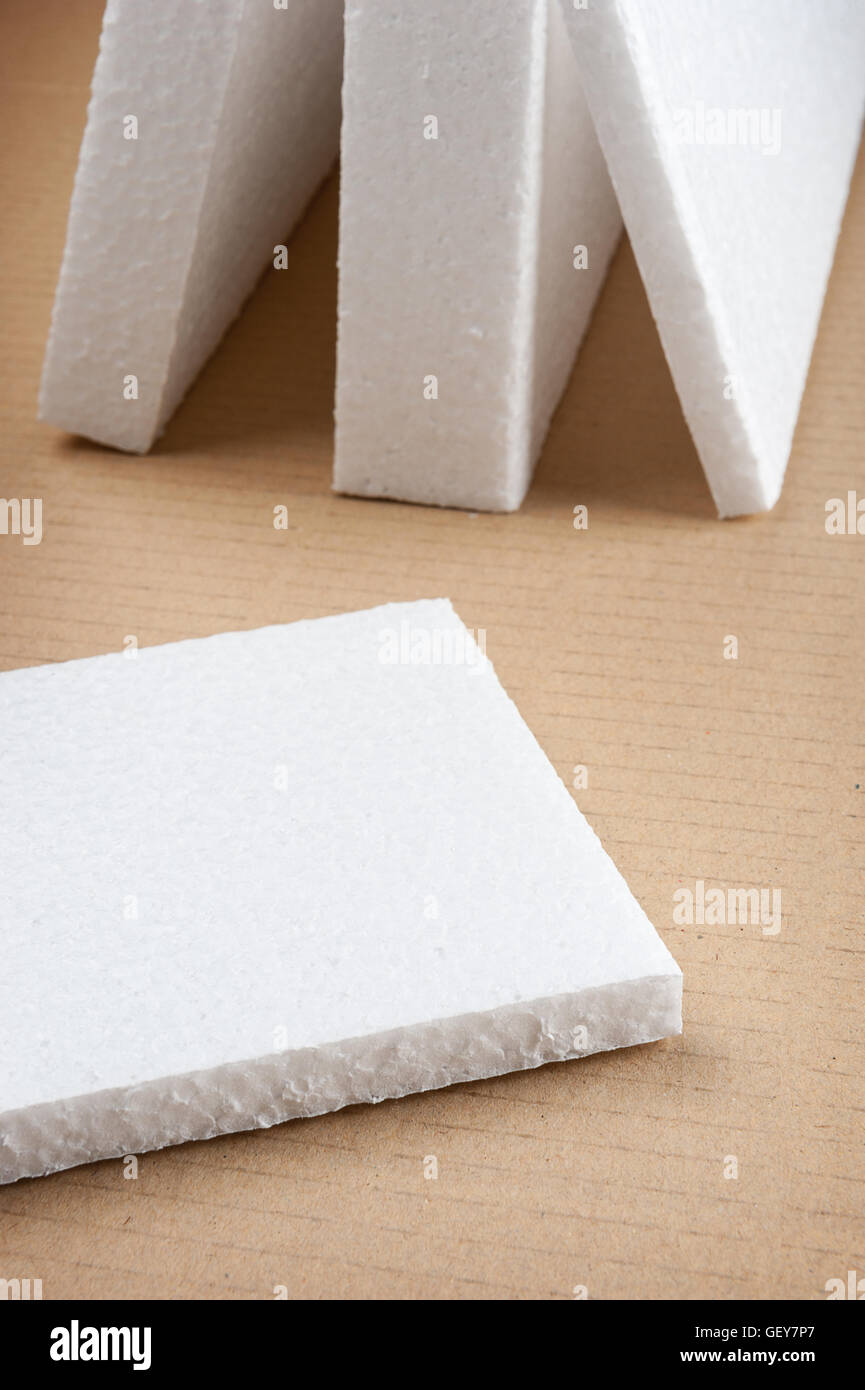 Closeup white foam on cardboard hi-res stock photography and