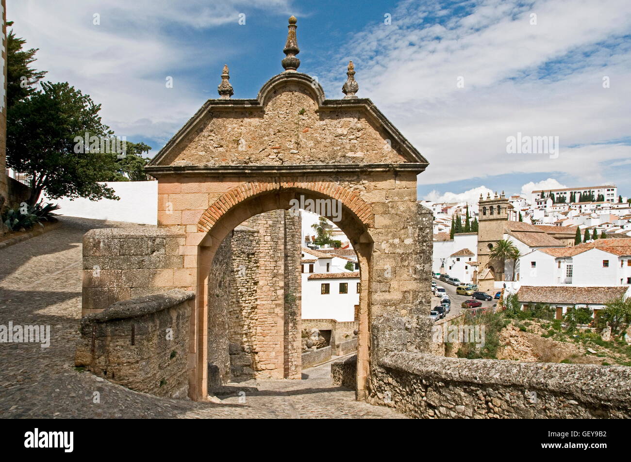 geography / travel, Spain, province Malaga, Andalusia, Ronda, arch by Felipe V, gate of the bridge, seat of the Moors, church Padre Jesus, Stock Photo