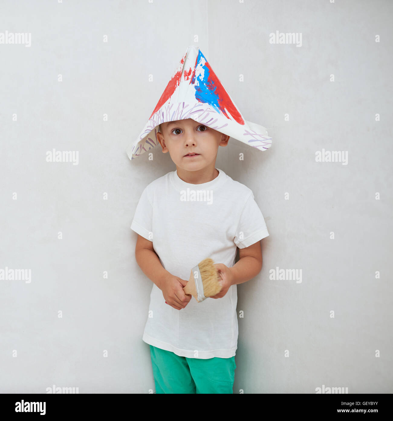 little happy boy with colorful brush Stock Photo - Alamy