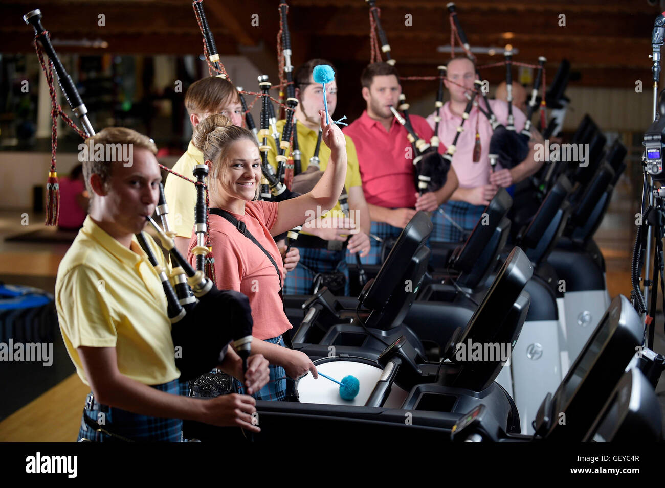 (Left to right) Richard Gill, Fiona Bowes, Ciaran Gaughan, Blair Wishart, Keith Bowes and Craig McInnes from Johnstone Pipe Band work with personal trainers at David Lloyd Renfrew to create a workout programme for the start of the international piping season in Scotland. Stock Photo