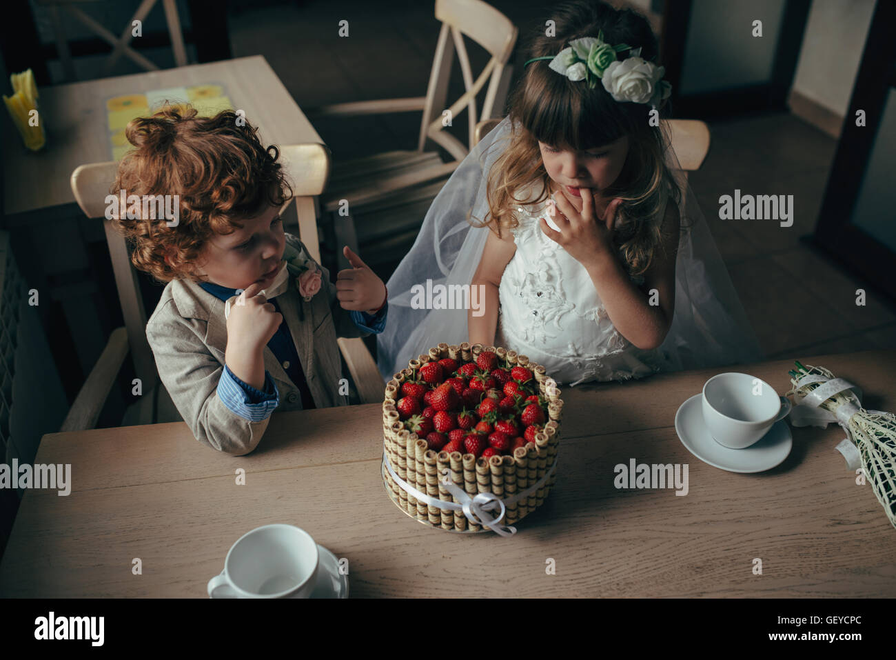 Boy girl playing tea party hi-res stock photography and images - Alamy