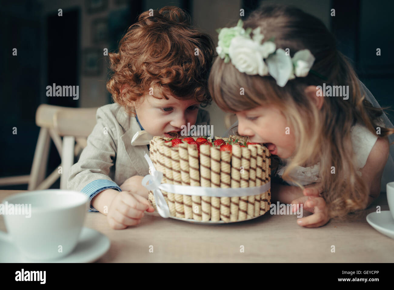 Boy girl playing tea party hi-res stock photography and images - Alamy