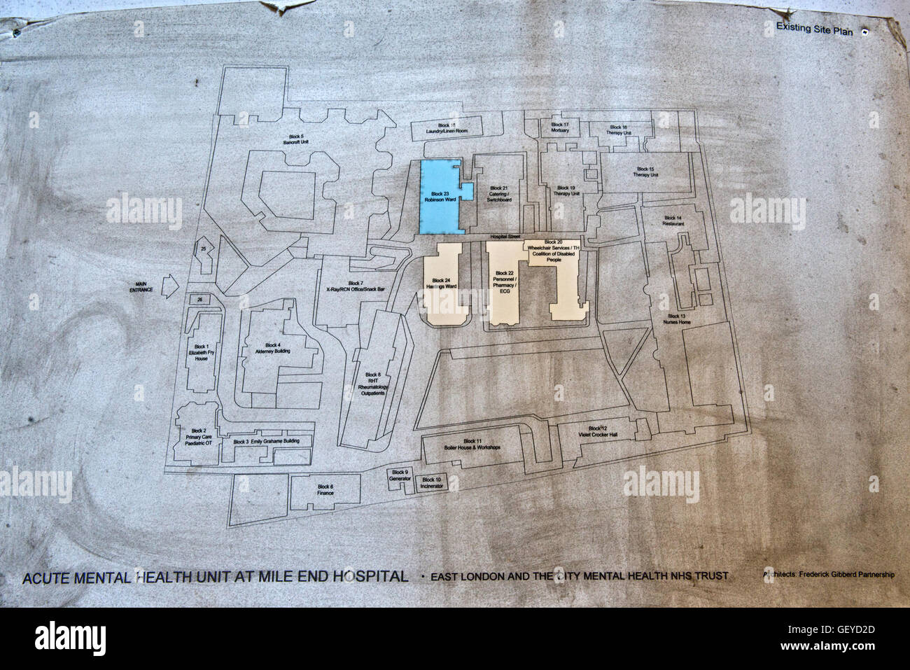 A site map still hangs within part of the closed St Clements Hospital in London's East End before the major redevelopment. Stock Photo