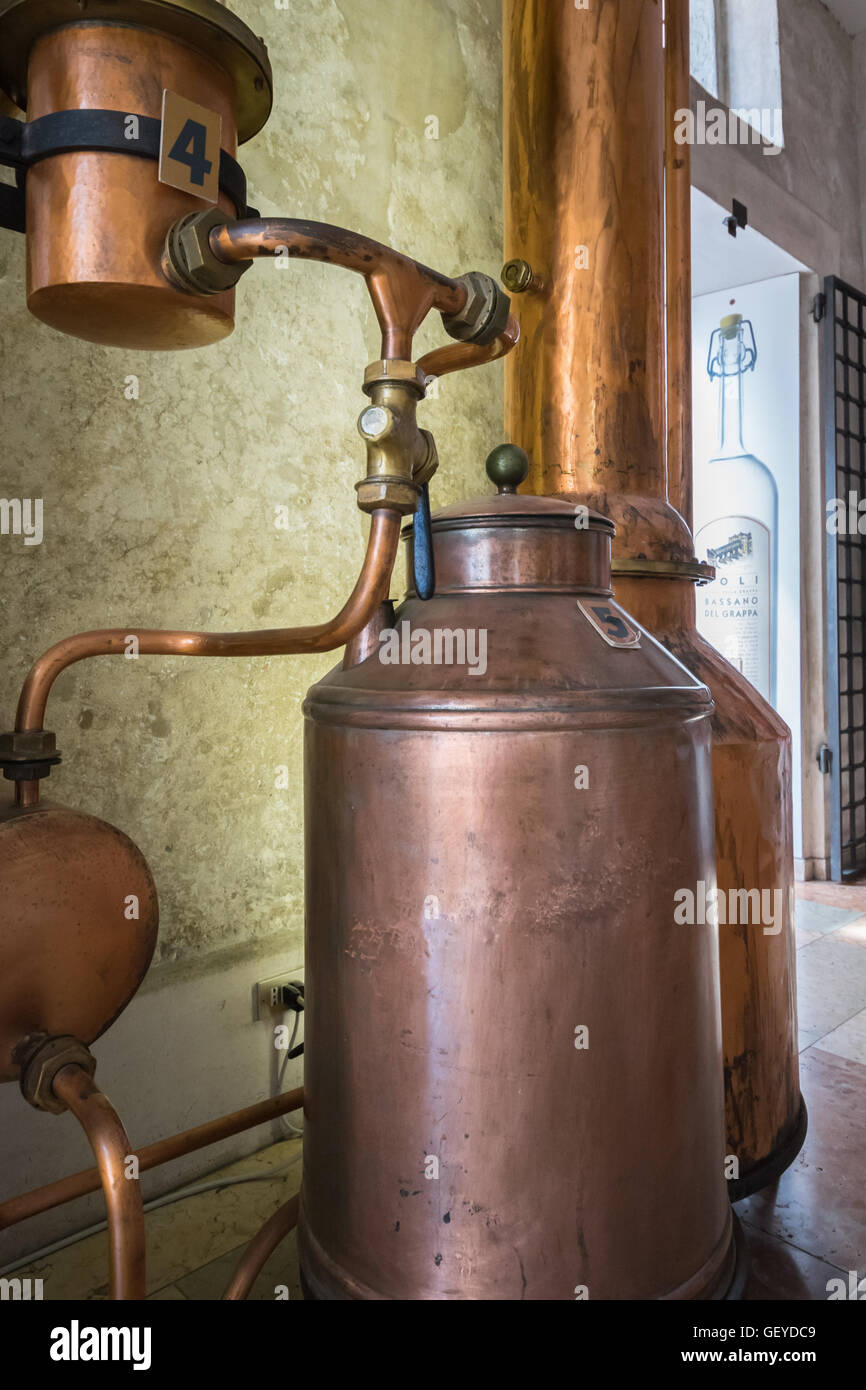 Details of copper tools used to distil grappa. Stock Photo