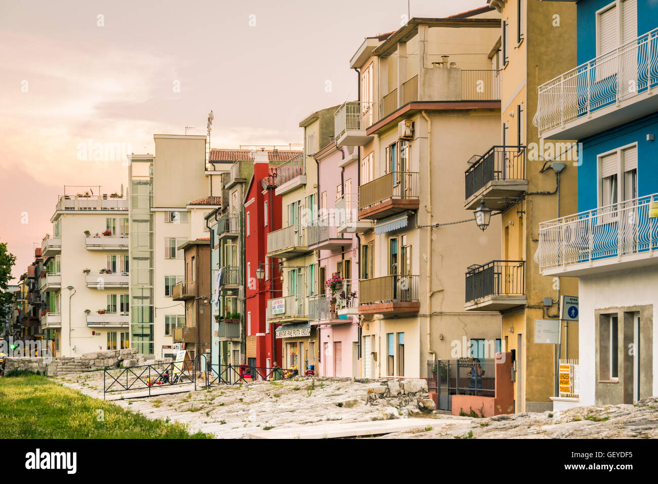 Typical houses in Sottomarina (Italy) with the embankment that protects them from sea storms. Stock Photo