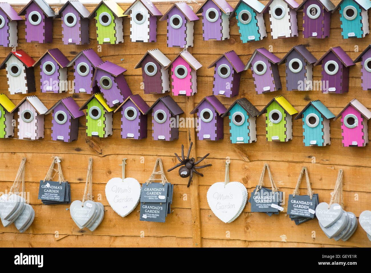 Colourful bird boxes for sale on stall at New Forest & Hampshire County Show, Brockenhurst in July Stock Photo
