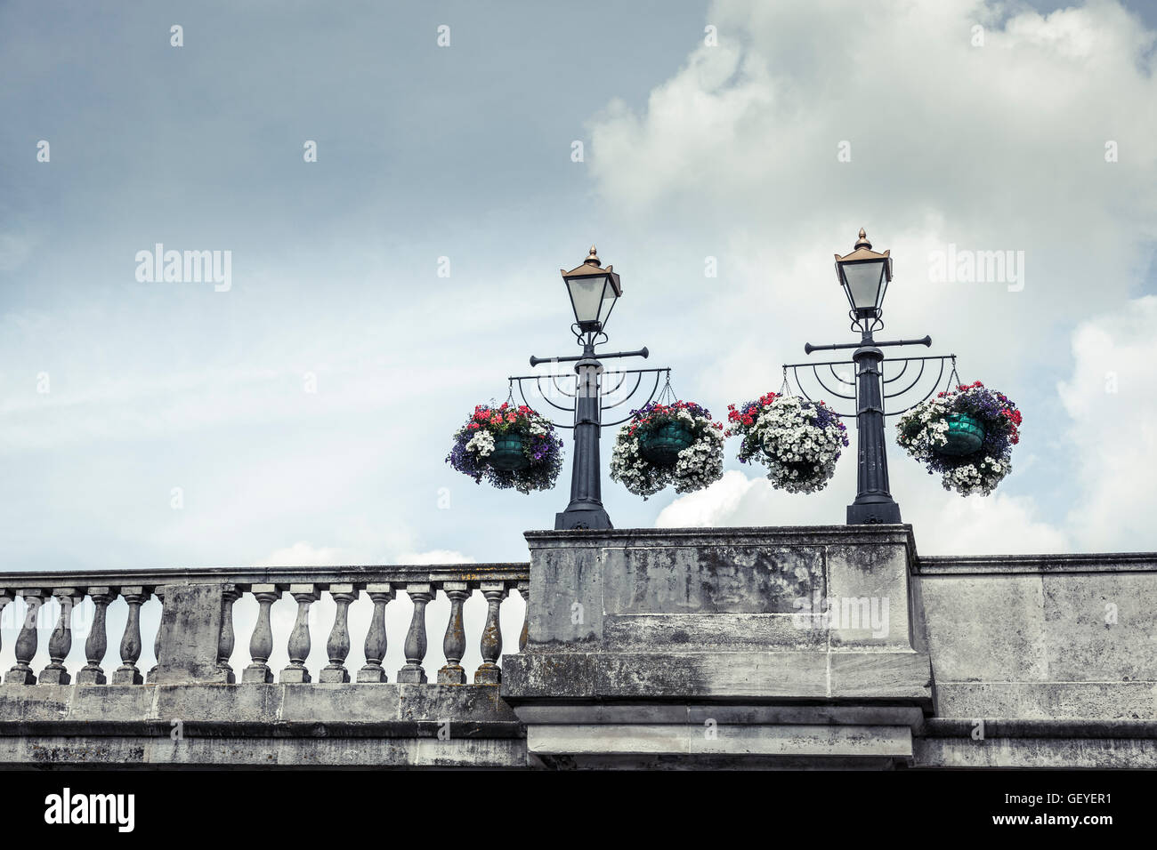 Colourful hanging baskets on the bridge at Kingston Stock Photo Alamy