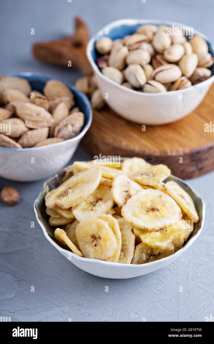 Banana chips and nuts Stock Photo Alamy