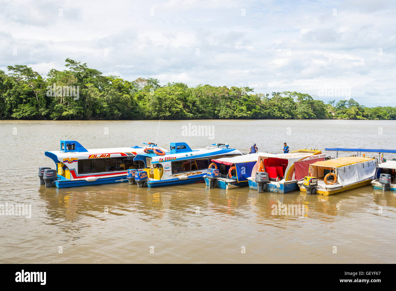 Colourful riverboats moored at the docks, El Coca (Puerto Francisco de Orellana), Napo River, Amazon rain forest, Ecuador Stock Photo