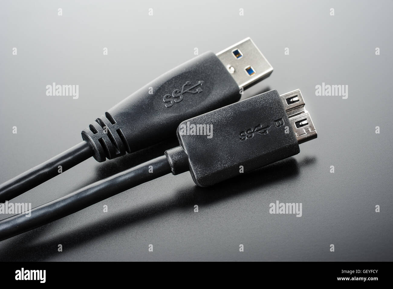 usb 3.0 cable isolated on black Stock Photo