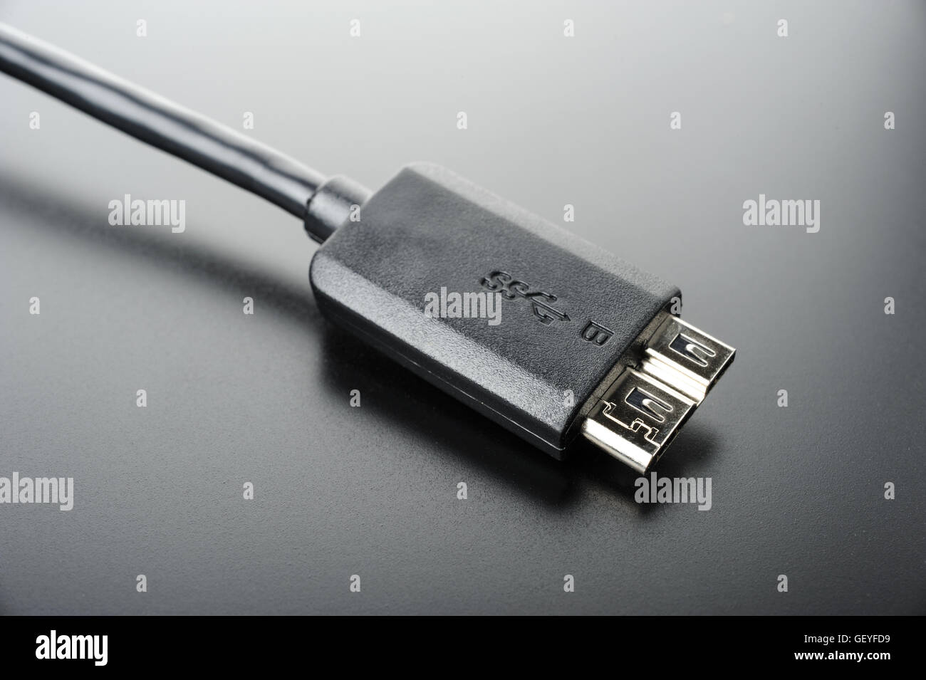 usb 3.0 cable isolated on black Stock Photo