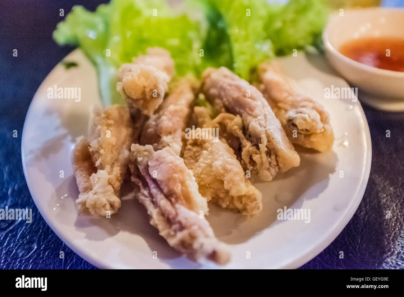 Delicious deep fried chicken wings with sweet chilli dipping sauce