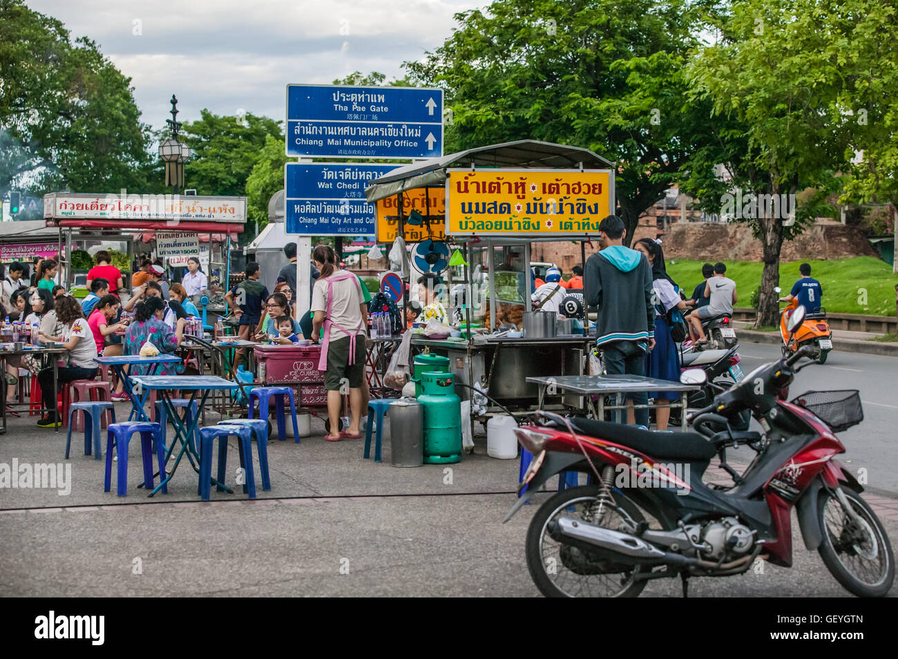 People eating street food in Chang Phuak Gate food market,north gate Chiang Mai Thailand Stock Photo