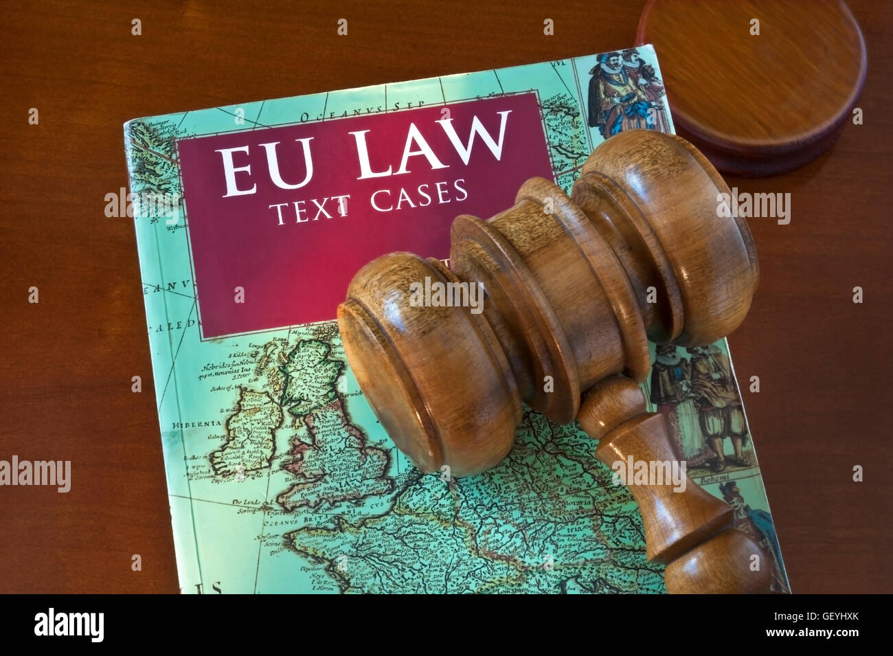 BREXIT Concept image of EU Law book with map of UK and continental Europe front cover, on desk with judges gavel Stock Photo