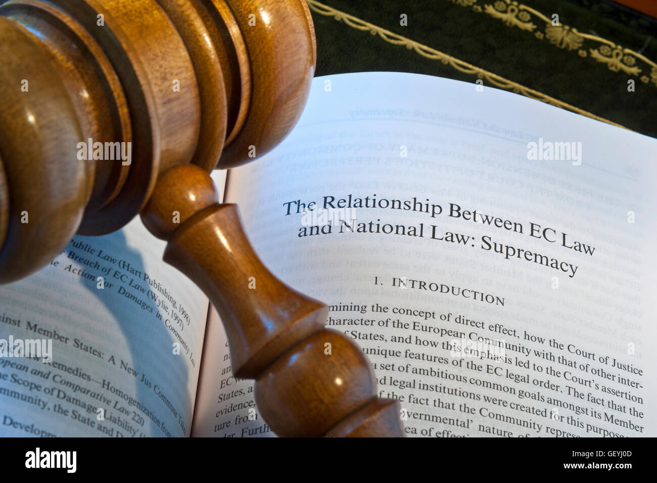 BREXIT EU LAW Concept image of EU reference Law laws book on desk with judges gavel on page reference to EC Law & National Law-Supremacy Stock Photo