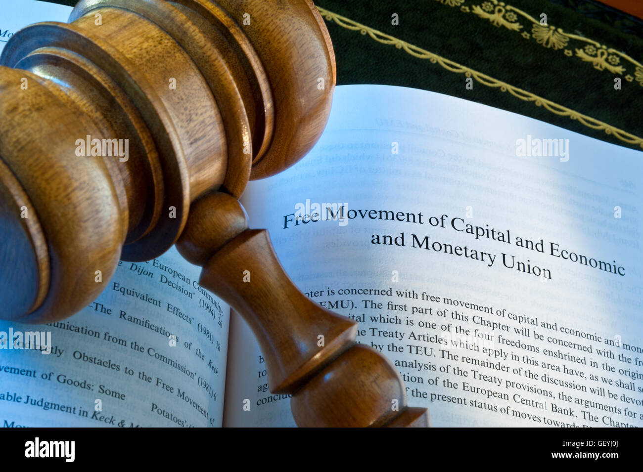 Concept image of open EU reference Law book on desk with judges gavel on page reference to 'Free movement of Capital...' Stock Photo