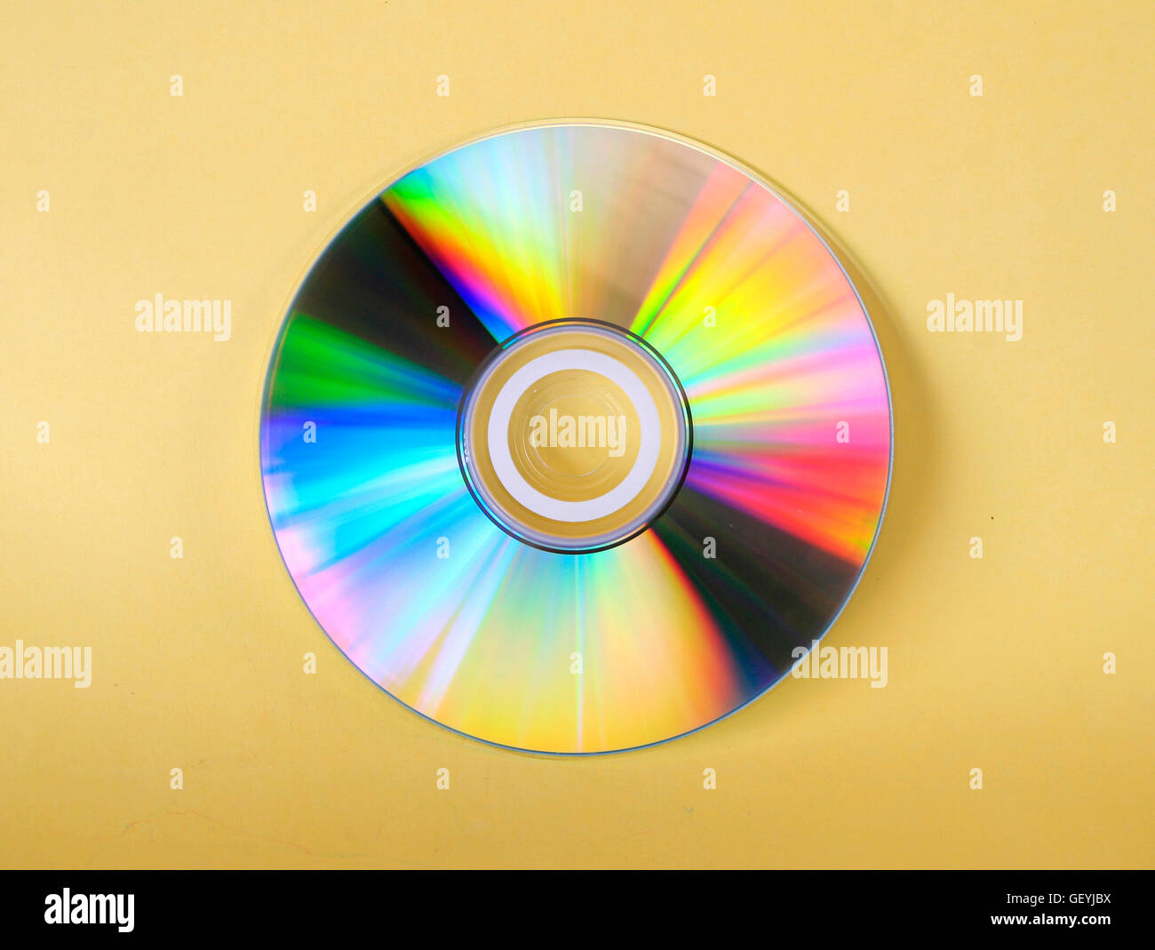 Close-up of one computer cd reflecting rainbow colours Stock Photo