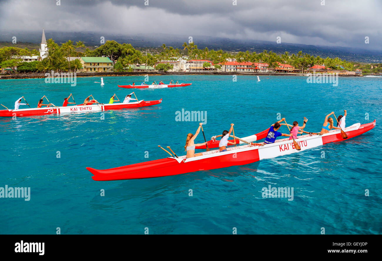 Outrigger canoes in Kailua Bay on the Big Island of Hawaii Stock Photo