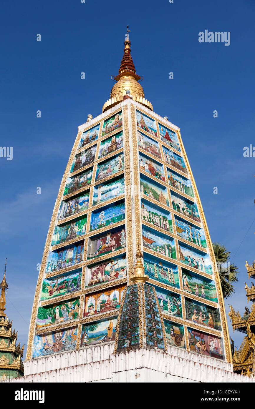 Inspired by the Indian Mahabodhi temple, the column of Buddha in the Shwedagon Pagoda area, at Yangon (Myanmar). Stock Photo